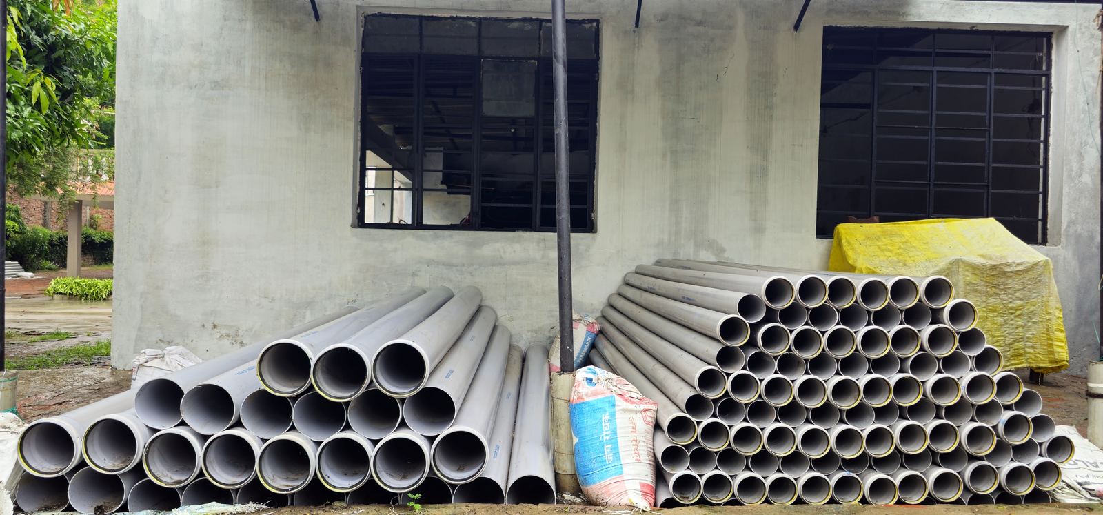 Pipe stock staged outside the manufacturing unit